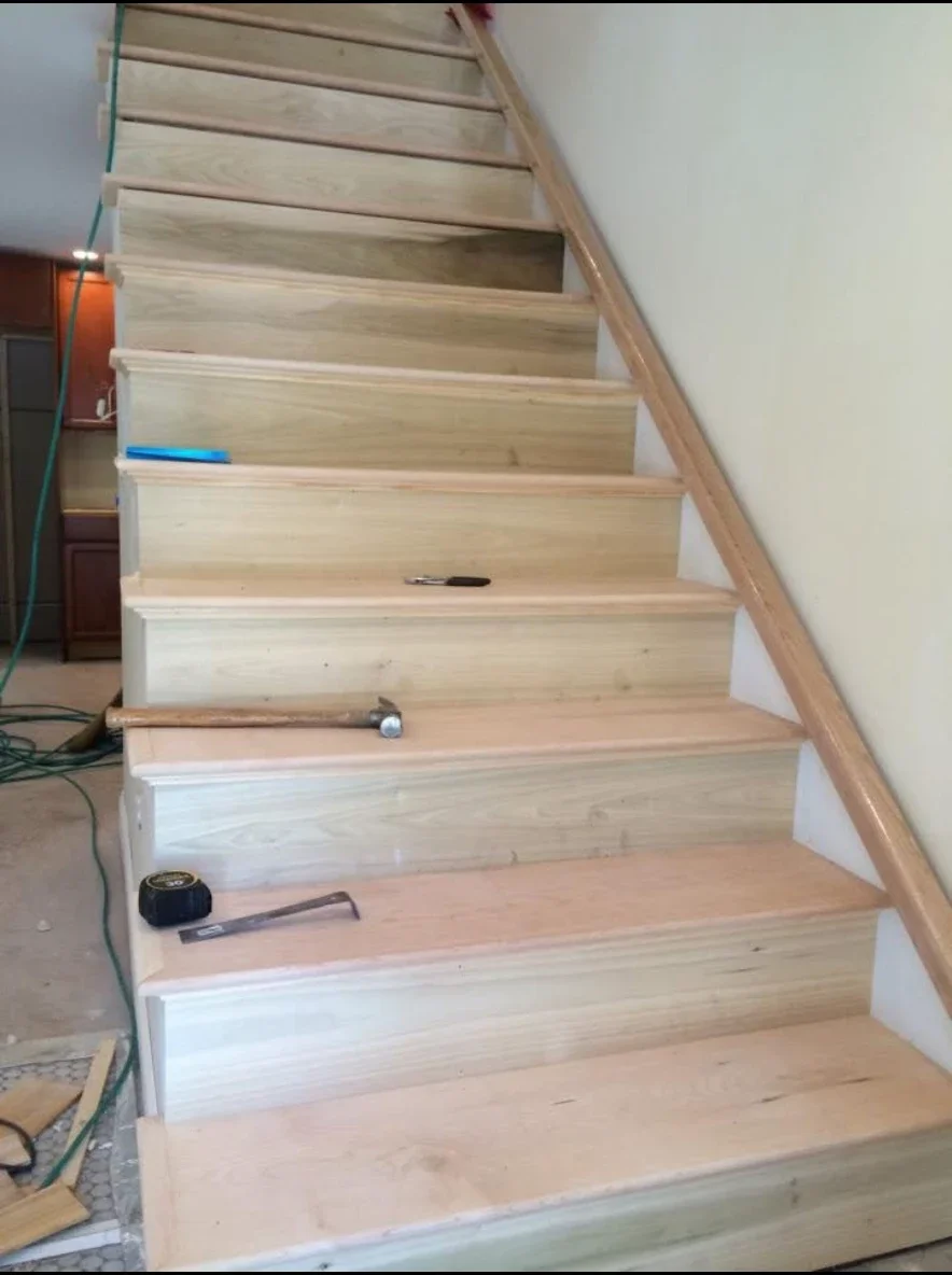Hardwood staircase and trim installed